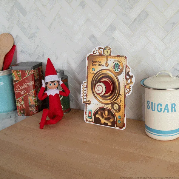 Le lutin ouvre un portail rempli de bonbons – idée de lutin farceur